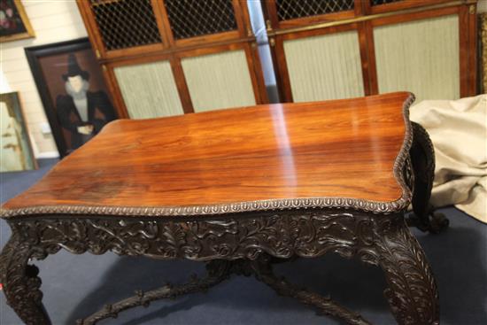 A 19th century Burmese hardwood centre or library table, W.5ft 10in. D.3ft 8in. H.2ft 6in.